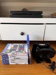 ps4 med två kontroller, dual shock laddare och 7 spel