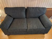 Fin och välvårdad 2-sits soffa