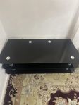 tv bord gjord av glas