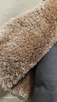 Beige ryamatta