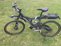 Elcykel med mittmotor