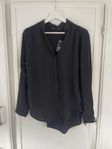 Svart blus