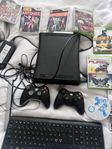 ett Xbox 360 med en massor med spel 