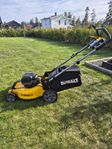 Batteridriven Dewalt gräsklippare