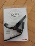 Capo för gitarr av märket Kyser