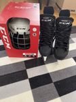 Hockey skridskor och hjälm 
