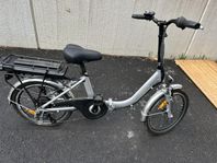Vikbar växlad elcykel 