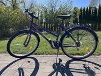 18 växlad hybridcykel Nishiki