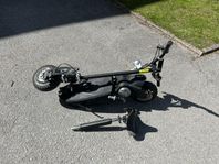 elscooter med säte