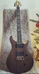 Mark Holcomb PRS 7 strängare i Walnut