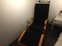 Vilfåtölj med fotpall