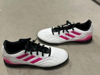 Adidas shoes and shin pads