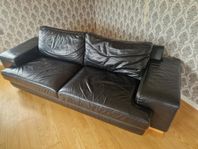 Soffa med fotpall
