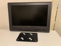 Tv med väggfäste 23”