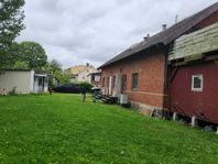 stor hus med 4 lägenheten 