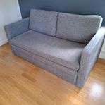 Fin grå bäddsoffa från Chili med förvaring 135*200 cm