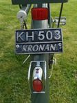Kronan med handbok och kvitto