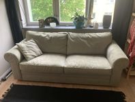 Ljusgrön soffa