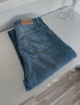 Blå högmidjade jeans
