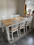 Bord och 6 stolar + en opakad stol