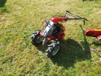 Hjultraktor med slåtterbalk och jordfräs Honda F560