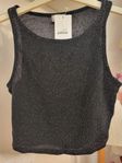 Glittrig  topp