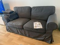 Ektorp soffa från IKEA med tillhörande oanvänd klädsel.