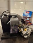 Kaffebryggare/kapselmaskin Nespresso F521 inkl kapslar