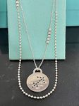 Tiffany’s & co Sagittarius’s pendant + chain 28-30”