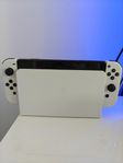 Nintendo Switch OLED + 4 populära spel