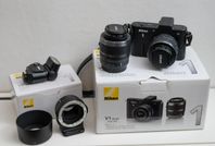 Nikon 1 V1 kit med 2 objektiv, blixt och FT1 adaptor