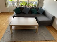 L-Shaped Sofa Bed + Table & Rug 