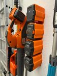 Smarta batterihållare för Husqvarna BLi-batterier