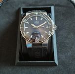 Oris Aquis date