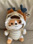 Cute doll with dragon clothes