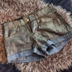 Snygga guldiga shorts, stl XS oanvända 