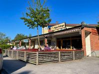 Väletablerad vedugnspizzeria i Bandhagen