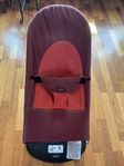 Röd babybjörn babysitter / bouncer
