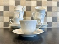 9 gulliga små kaffekoppar
