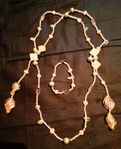 Rosa halsband och armband
