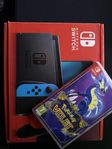Nintendo Switch med tillbehör och spelet Pokémon Violet