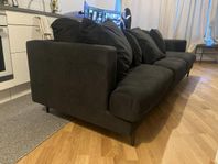Djup dunsoffa i nyskick från Ellos