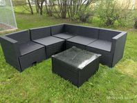 Loungegrupp i svart rotting