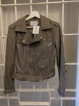 Beige bikerjacka i skinn