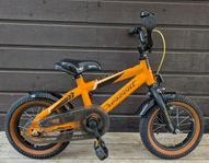 barncykel Crescent Knytt 12 tum Designad ca och utvecklad