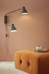 Vägglampa med två armar i nyskick 