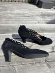 Penelope svarta moccaskor med klack