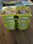 12 askar oöppnade Lego minifigurer Series 27