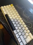 säljer en 60% gaming tangentbord