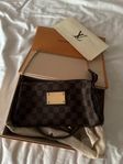 Louis Vuitton Eva clutch